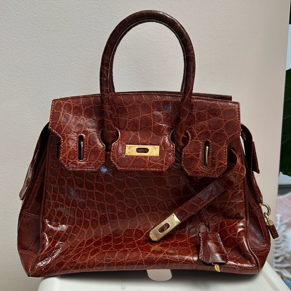 Crocodile cognac handbag with gold lock and detail